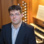 Bild von Nils Ole Kraft an der Orgel